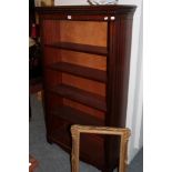 A modern stained mahogany bookcase with four adjustable shelves, 91cm wide 29.5cm deep 152cm high