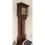 An oak thirty hour long case clock, the square brass dial with applied plaque inscribed Thomas