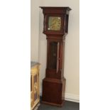 A stained pine thirty hour long case clock, the square brass dial inscribed below six Aaron