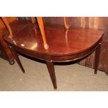 A George III mahogany console table, converted from a dining table with square tapered legs to