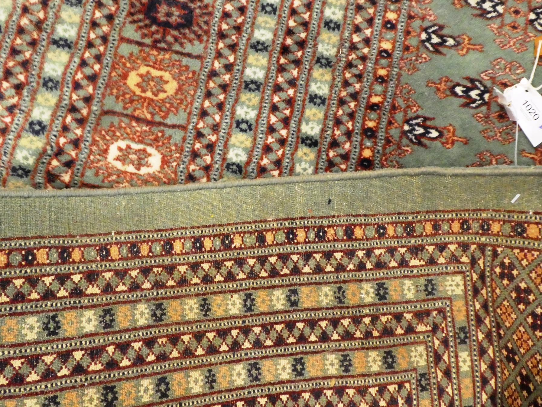 Lahore Bukhara carpet, the mint field with an all over design of Turkmen guls enclosed by multiple - Image 5 of 6