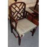 * A George III Chinese Chippendale style mahogany open armchair, lattice work back and square