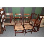 * A part set of five Regency mahogany dining chairs, including two carvers, together with a set of