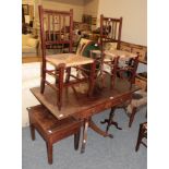 * A Regency mahogany sofa table, twin drop-flaps, raised on central column to out splayed