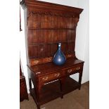 An 18th century style small oak dresser and rack