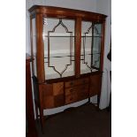 An Edwardian inlaid walnut display cabinet. 125cm wide by 37cm deep by 185cm high. Uniform fading,