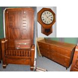 A sideboard fitted with eight drawers, a double bed frame and a single bed frame and a drop dial