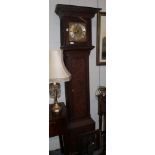 A carved oak thirty hour long case clock, dial chapter ring signed WM Hoadley, Rotherfield, single