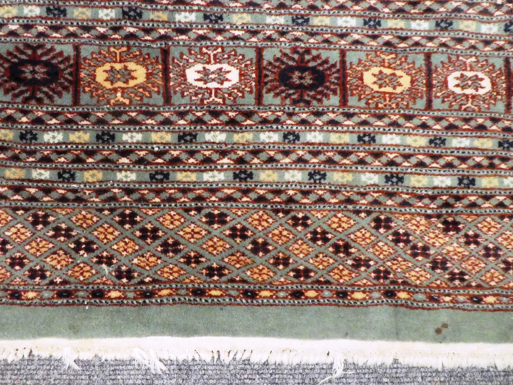 Lahore Bukhara carpet, the mint field with an all over design of Turkmen guls enclosed by multiple - Image 3 of 6