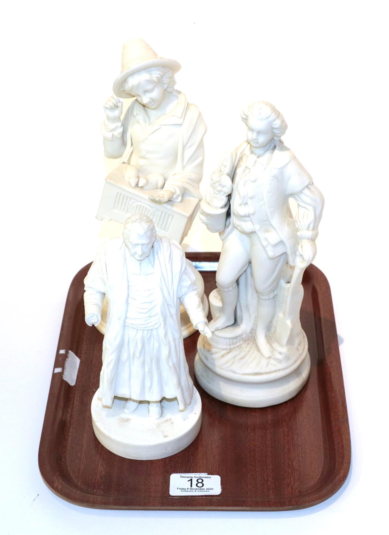 Three Victorian Parian bisque porcelain figures comprising a gardener, Wesley and a peasant boy with