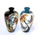 Two Moorcroft butterfly vases (2). 16cm high and in good condition.