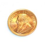 South Africa, 1974 Krugerrand. 1 oz. fine gold (.999). Obv: Bust of Paul Kruger left. Rev: