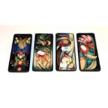 Four various Moorcroft pen trays . 20cm by 9cm. Good condition. All first quality.