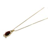 A garnet pendant on a snake link chain, both stamped '750', pendant length 4.2cm, chain length 51.