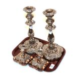 Two pairs of plated candlesticks (4)