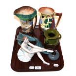 A tray of ceramics including Burleigh ware jugs, Bretby vase, Royal Dux ballerina, Beneagles curling