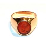 A cornelian intaglio ring, unmarked, finger size V. Gross weight 13.2 grams.