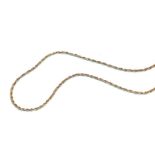 A fancy link chain, stamped '9K', length 155cm. Gross weight 62.3 grams.