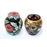 A Moorcroft poppy ginger jar and another (2) . Both first quality. Red flower jar and cover - some