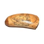 A 19th century Scrimshaw decorated sperm whale tooth with attached label ''Saldanha Bay' August 11th