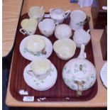 Tray of assorted Belleek tea china, including cream, sugar and a mug