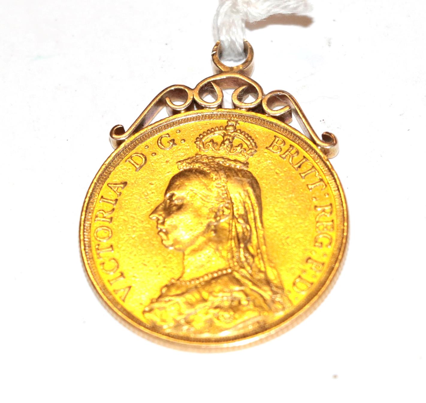 An 1887 double sovereign, mounted