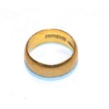 A 22 carat gold band ring, finger size M. Gross weight 8.07 grams.