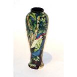 A Moorcroft green woodpecker vase. 26cm high. Good condition.