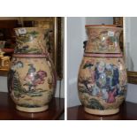 A pair of early 20th century famille rose crackle ware vases decorated with figures in a garden,