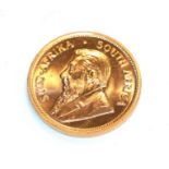 South Africa, 1974 Krugerrand. 1 oz. fine gold (.999). Obv: Bust of Paul Kruger left. Rev: