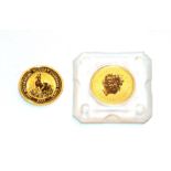 2 x Australia, $15, 1/10 oz .9999 Gold Coins featuring the 1999 and 2001 kangaroo types. Rim nicks