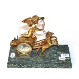 A 19th century French gilt-metal mantle clock, in the form of a chariot with green marble base (