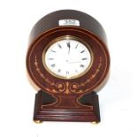 An Edwardian mahogany and marquetry inlaid mantel clock