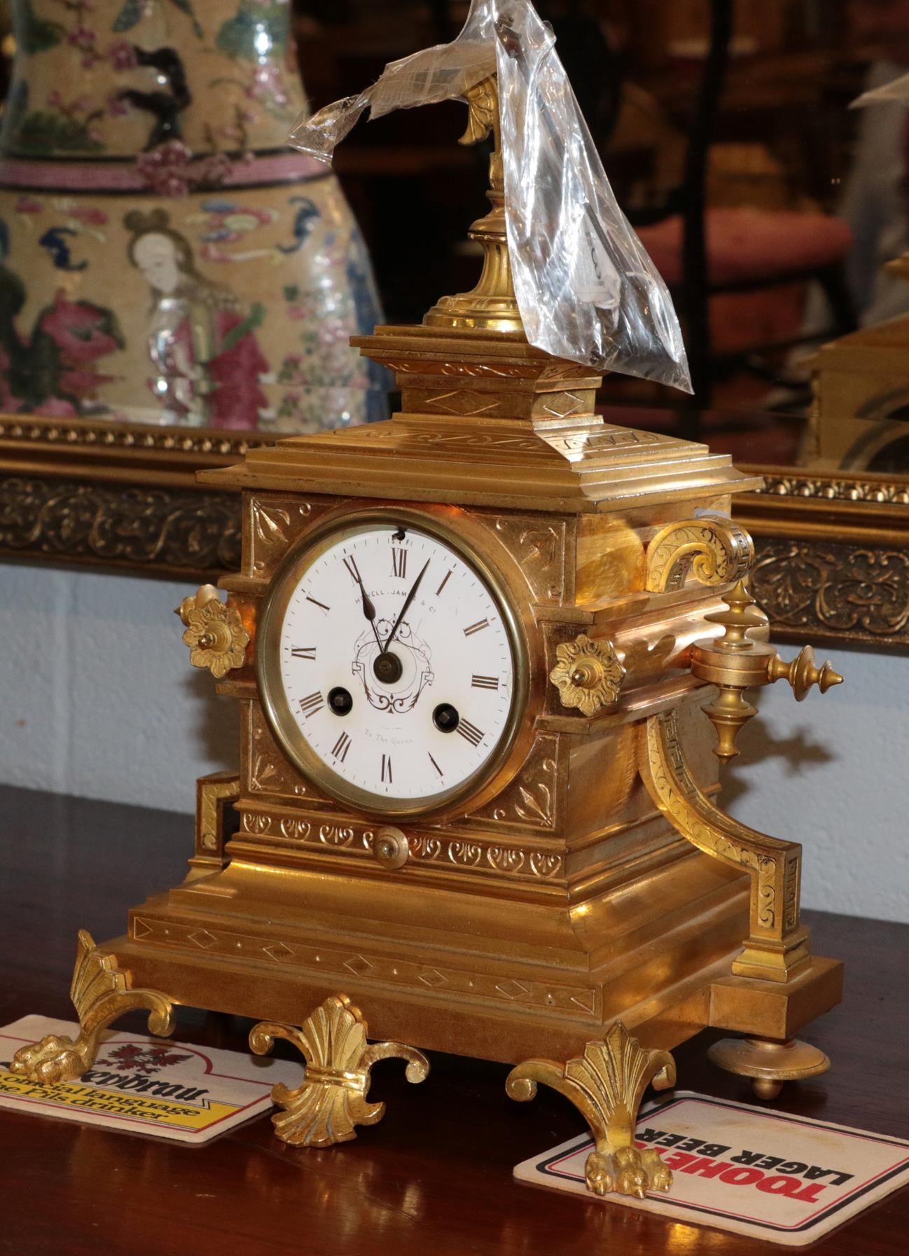 A 19th century ormolu mantel clock, Howell, James & Co., with winder