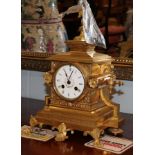 A 19th century ormolu mantel clock, Howell, James & Co., with winder