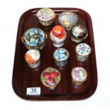 A collection of Moorcroft enamel boxes (10). All first quality. One of the box lids with one minor