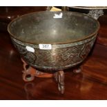 A 20th century brass Chinese punch bowl on stand. Stamped to the base 'Made in China', with wear