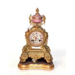 French gilt metal clock