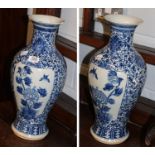 A near pair of late 19th/ealy 20th century large Chinese blue and white vases (one a.f.)