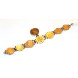 A coin bracelet comprised of various coins including 10 Francs, 20 Francs etc, length 19.5cm . Gross