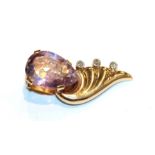 An amethyst intaglio and diamond clip, length 3.5cm . Unmarked, gross weight 7.6 grams.