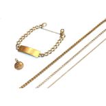 A 9 carat gold identity bracelet, length 20cm, a 9 carat gold St Christopher pendant, a curb link