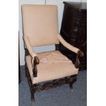 A 17th century walnut armchair, later recovered in geometric patterned fabric (wormed)