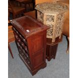 A reproduction hardwood sixteen-bottle wine rack; a carved and painted gilt table; a 1970's brass