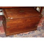 A brass bound oak chest with hinged lid, 94cm by 53cm by 56cm high