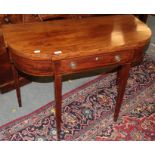 A late George III mahogany breakfront fold-over tea-table, with single drawer, 101cm by 57cm by 75cm