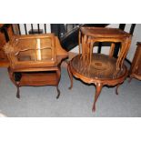 A reproduction circular cane and glass top coffee table; a walnut hanging corner cupboard with