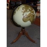 A large modern floor standing terrestrial globe