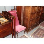 A four-piece Edwardian mahogany bedroom suite, comprising a dressing table, wardrobe, chest of