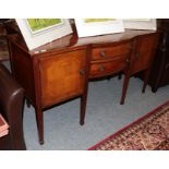 A Regency style mahogany inlaid sideboard